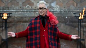 Actor Alan Cumming in stylish suit at film premiere