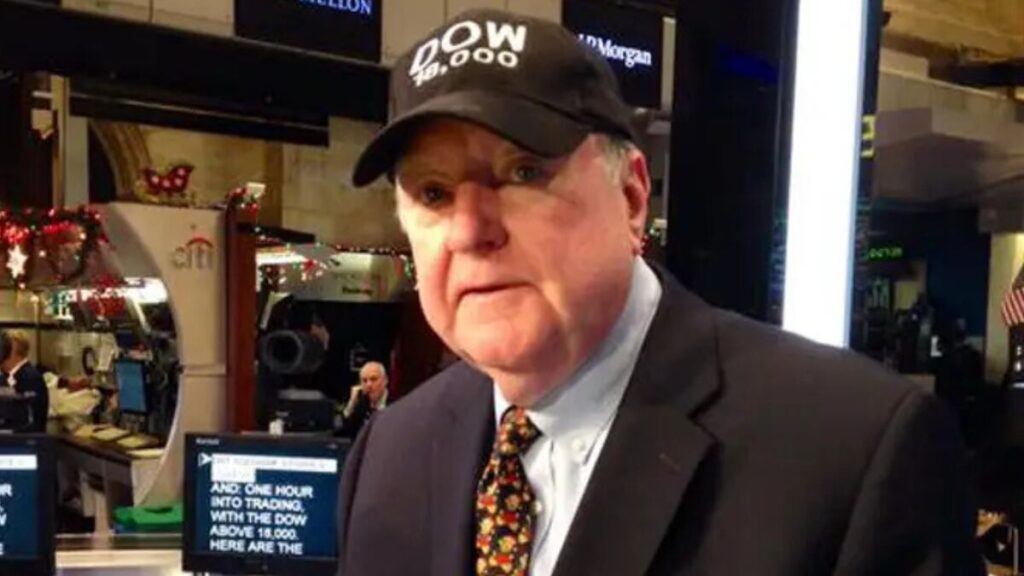Art Cashin speaking on the NYSE trading floor, representing his career in finance and media.