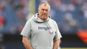 Bill Belichick coaching on the sidelines during an NFL game