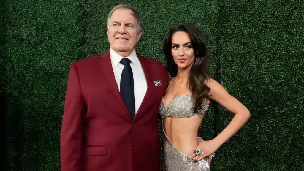 Bill Belichick and Jordon Hudson attending a public event together