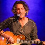 Billy Squier in a recent public appearance, 2020s, showing the legendary rock musician's enduring style