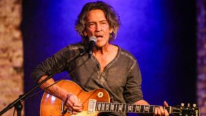 Billy Squier in a recent public appearance, 2020s, showing the legendary rock musician's enduring style