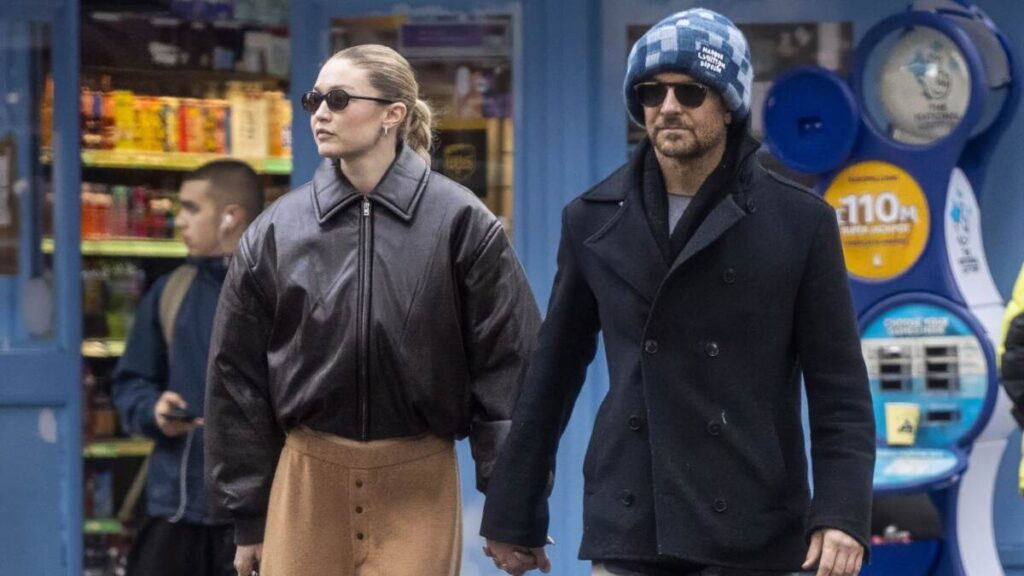 Bradley Cooper and Gigi Hadid walking together on the street, dressed casually
