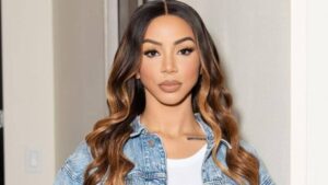 Brittany Renner smiling in a candid moment shared on social media.