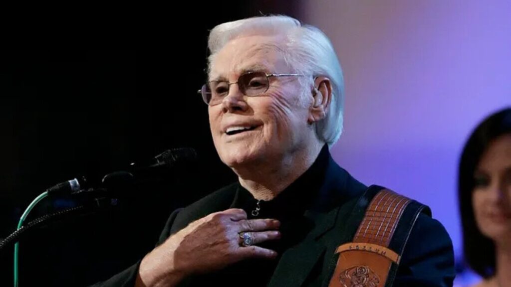 George Jones performing live on stage during a concert