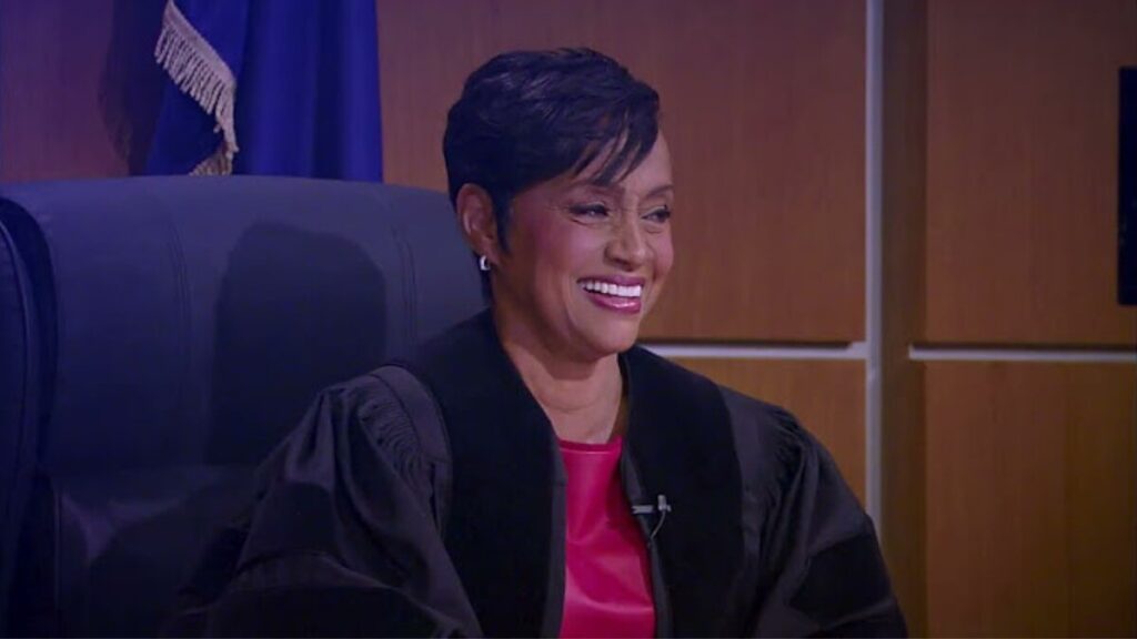 Glenda Hatchett on the set of her courtroom TV show, symbolizing her media and legal career
