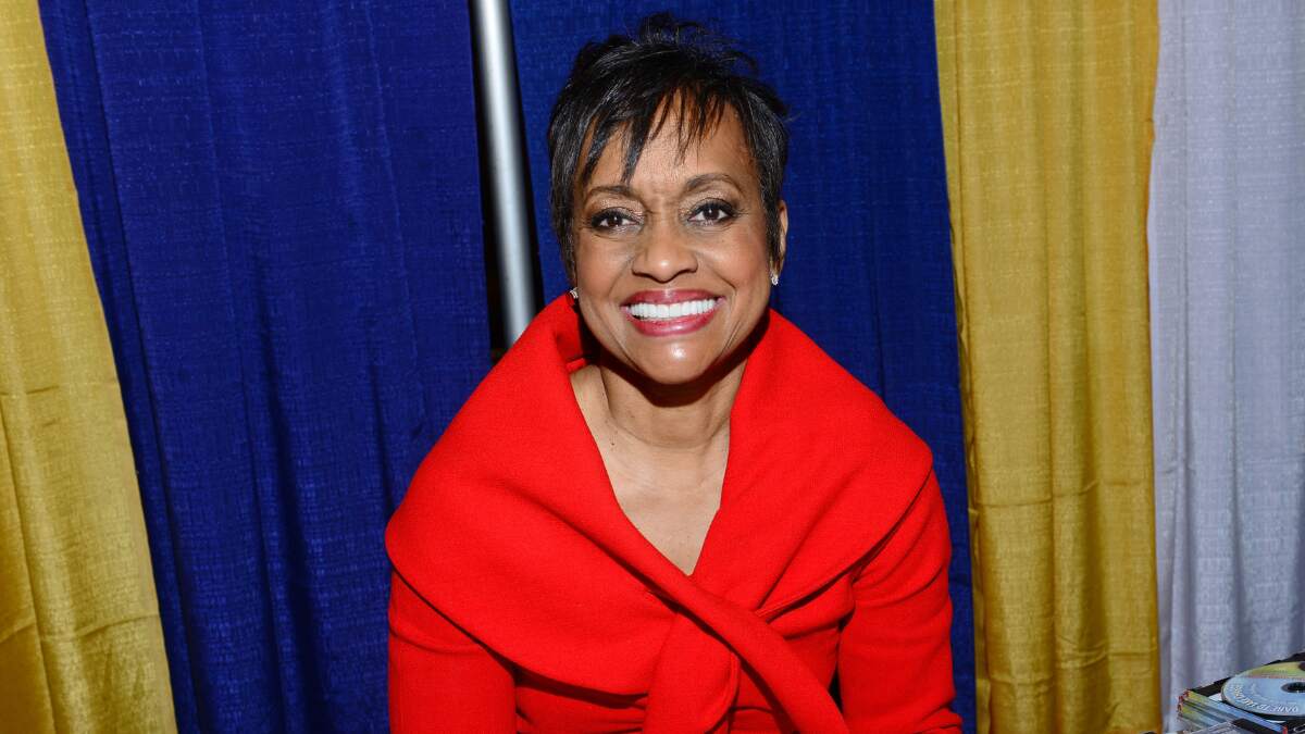 Judge Glenda Hatchett smiling in professional attire during public appearance