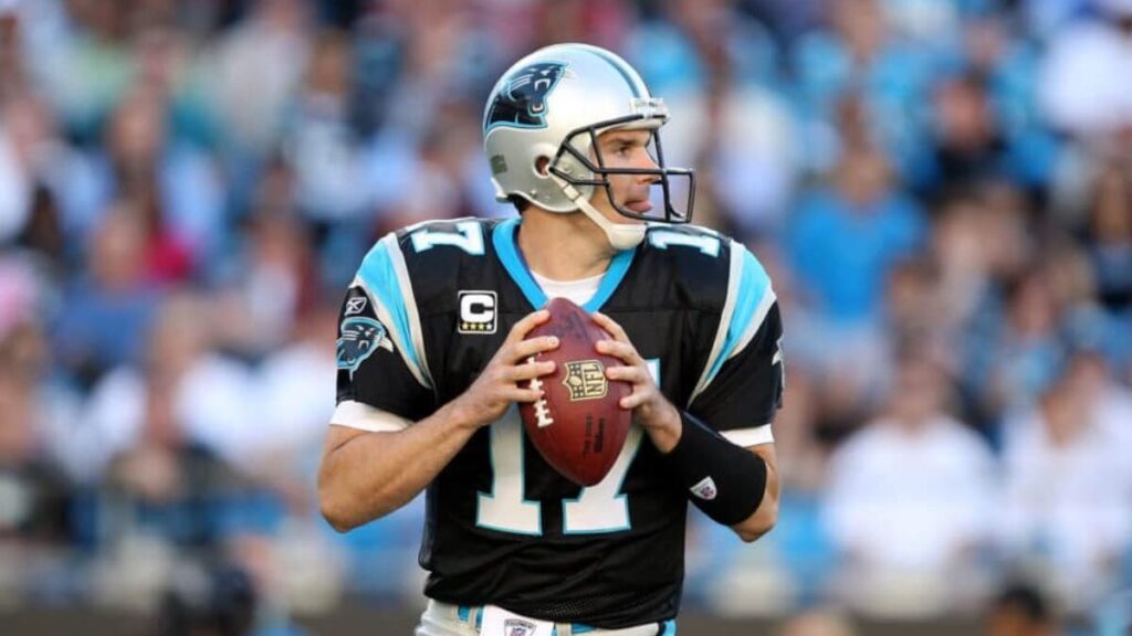 Jake Delhomme throwing a pass in a Carolina Panthers game.