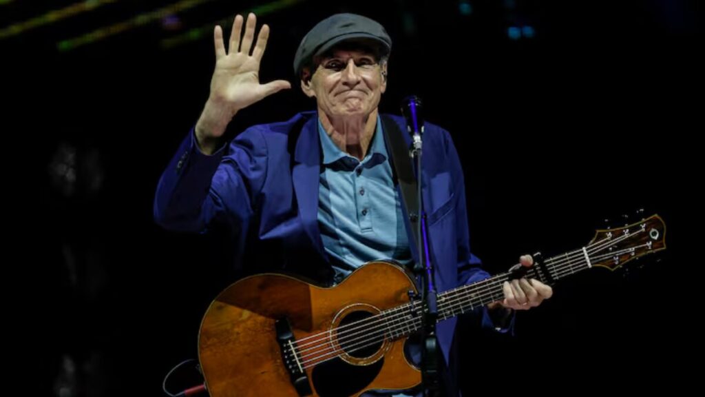 James Taylor performing on tour in the 2020s, highlighting his lasting impact on American music.