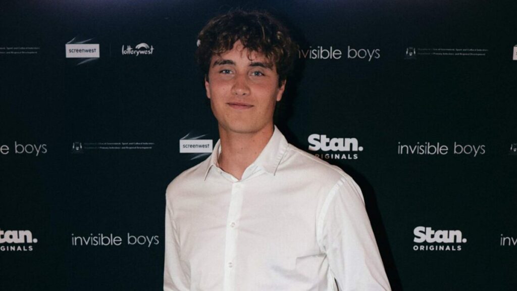 Joseph Zada at the red carpet premiere of We Were Liars (2025), wearing a black tailored suit — marking a key milestone in his acting career.