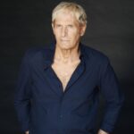 Michael Bolton, Grammy-winning artist, posing for a promotional photo