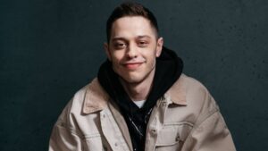 Pete Davidson posing for an H&M campaign photo shoot