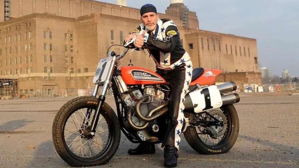 Robbie Knievel performing Stunt on motorcycle, showcasing the bike that contributed to his career earnings and fame.