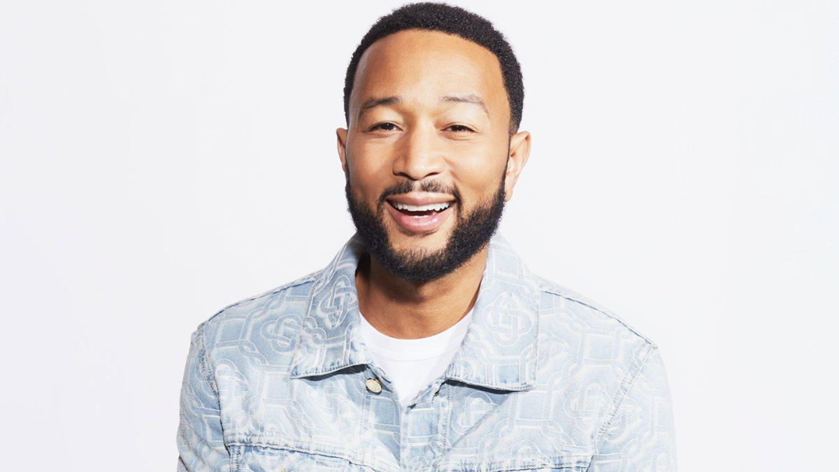 John Legend posing for a promotional photo in 2025