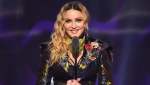 Madonna performing on stage during her 2025 world tour