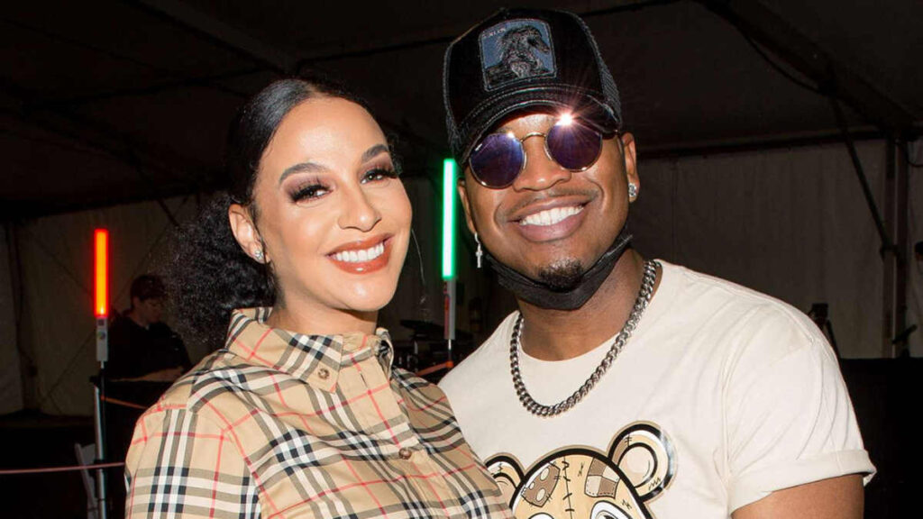 Ne-Yo and Crystal Renay posing together at a event before their 2022 split