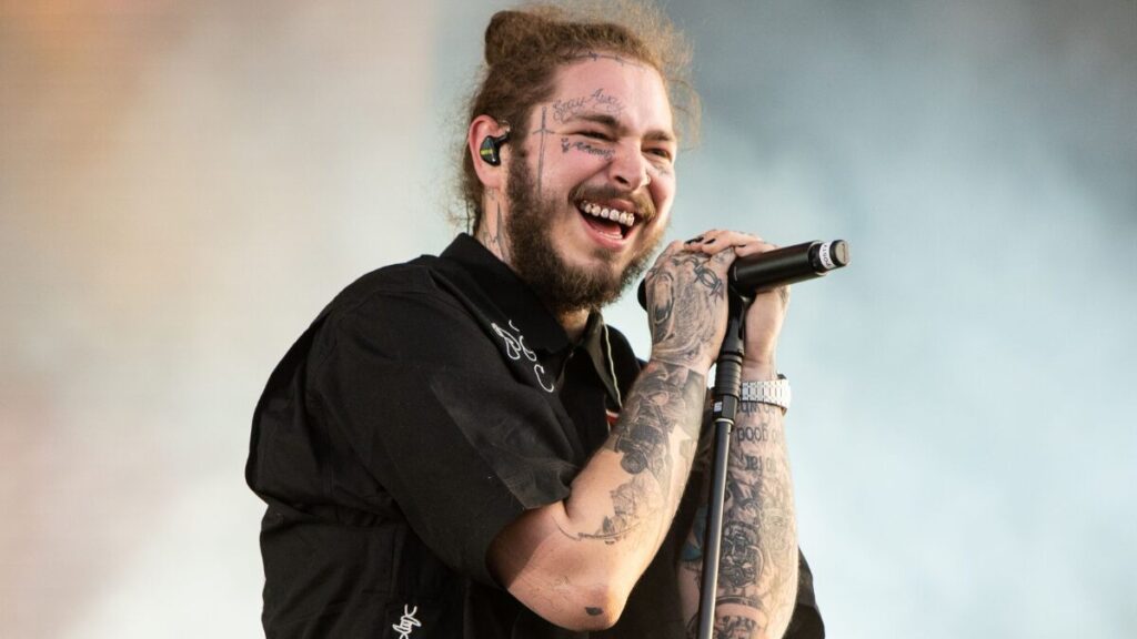 Post Malone performing live during his 2025 stadium tour.