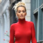 Rita Ora walking in London in a stylish streetwear outfit