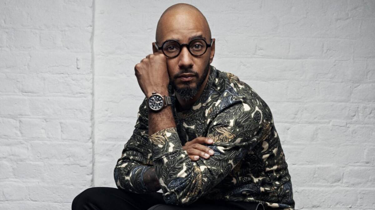 Swizz Beatz wearing designer streetwear in a professional photoshoot setting