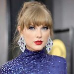 Taylor Swift speaking at a press event for The Eras Tour concert film