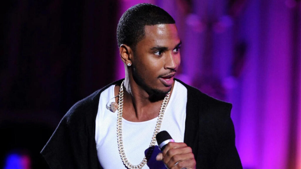 Trey Songz performing live on stage during a concert, showcasing his R&B career highlights.