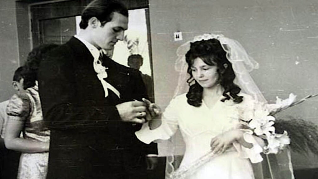 Young Alexander Lukashenko and Galina Zhelnerovich on their wedding day in 1975, dressed in traditional Soviet-era wedding attire