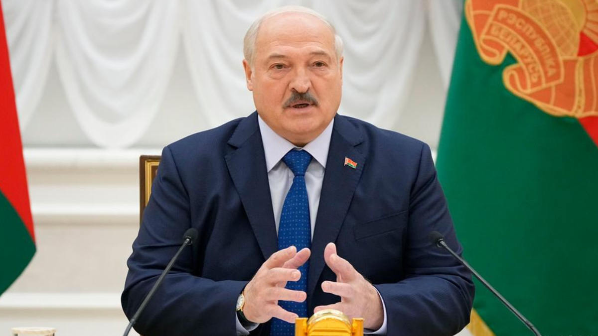 Alexander Lukashenko in a formal suit during a public address in Minsk
