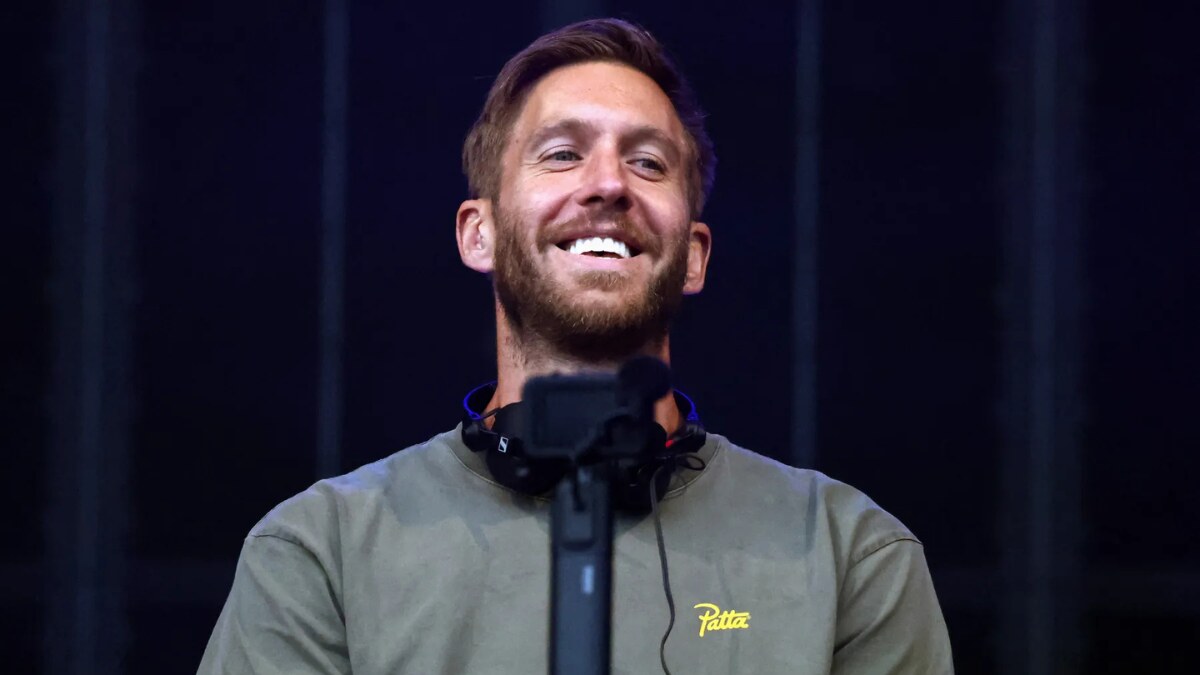 Calvin Harris performing live at a music festival.