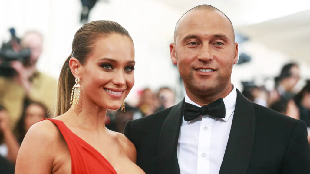 Derek Jeter and Hannah Davis attend a red carpet event in elegant attire