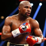 Floyd Mayweather Jr. landing a punch during fight.