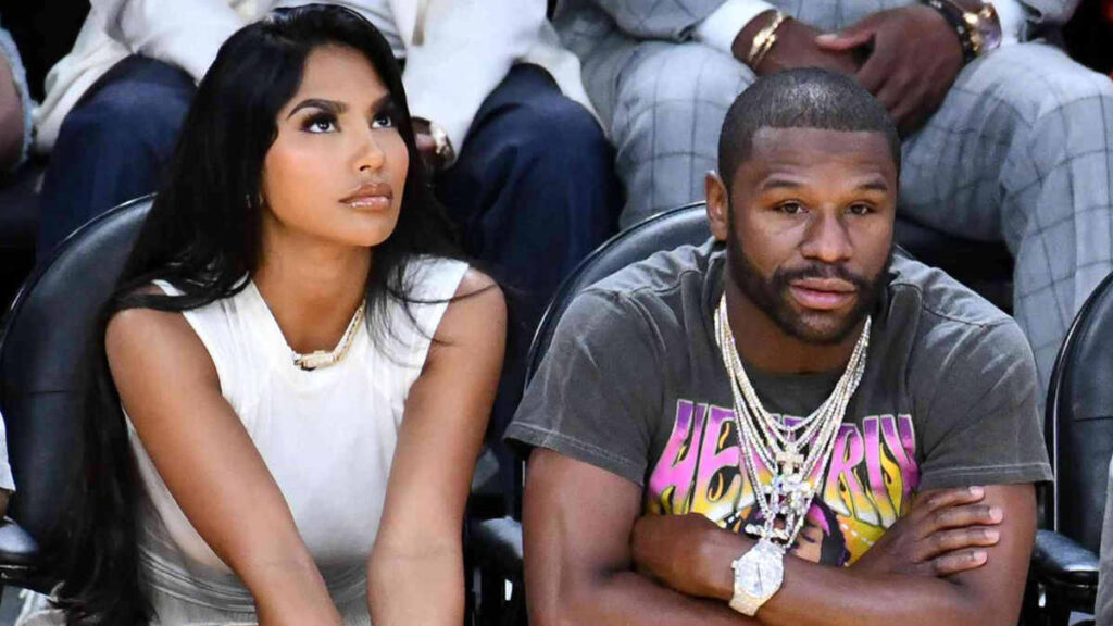 Floyd Mayweather Jr. and Gallienne Nabila photographed during watching match