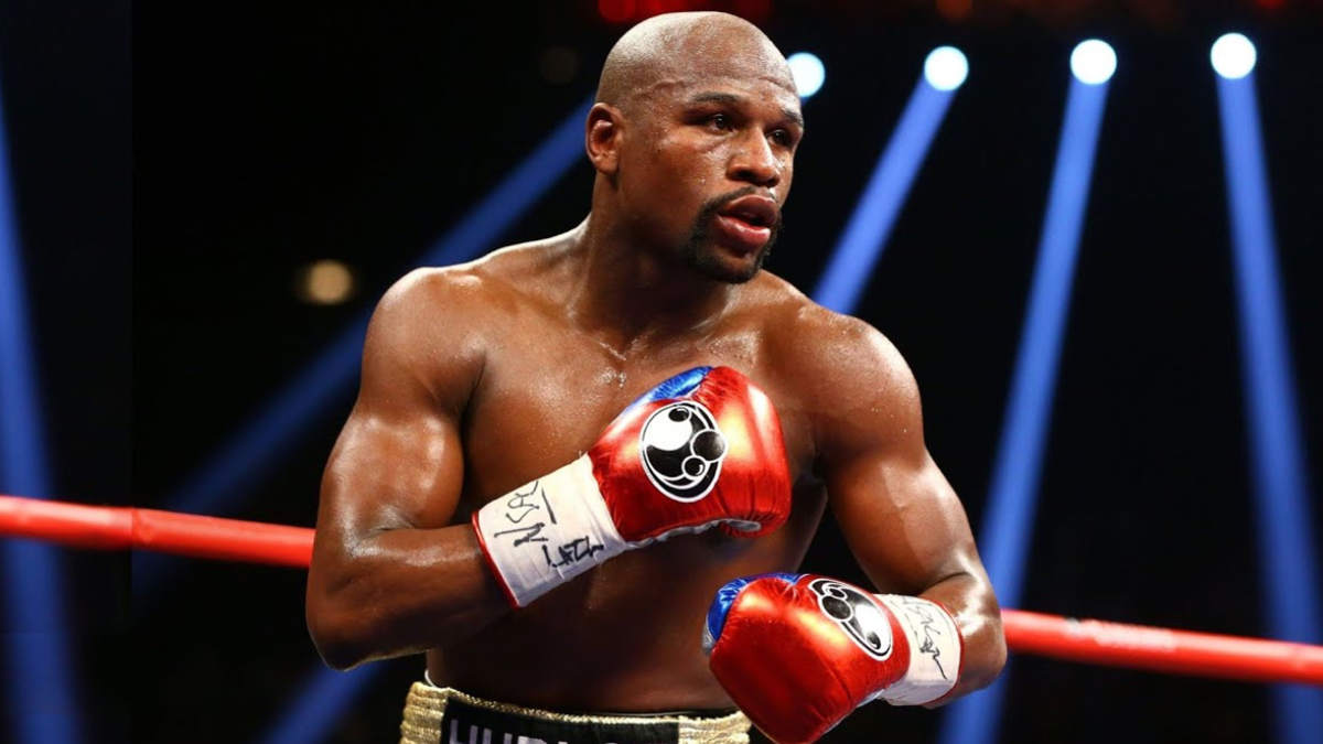 Floyd Mayweather Jr. landing a punch during fight.