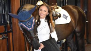 Georgina Bloomberg smiling in a professional portrait