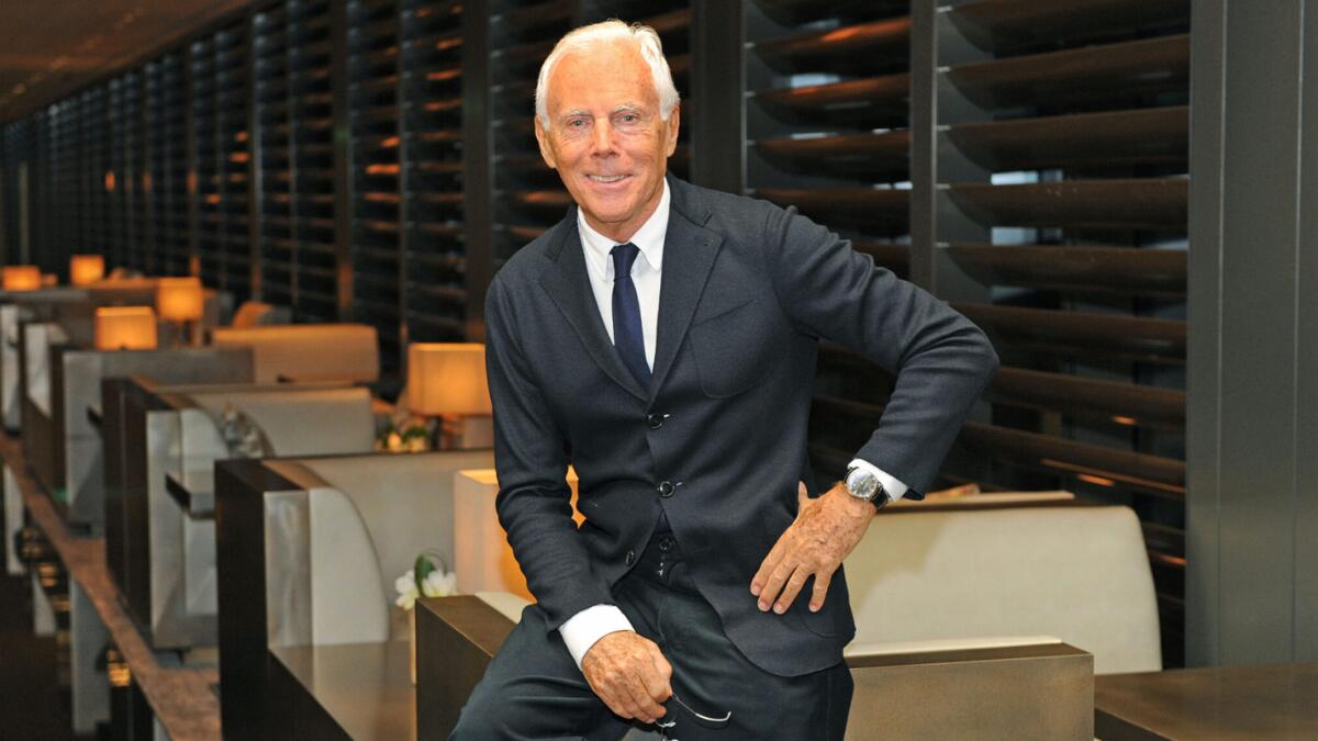 Giorgio Armani, Italian fashion designer and founder of Armani Group, in a classic black suit