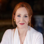J.K. Rowling outside her Edinburgh mansion, representing her luxury lifestyle and wealth