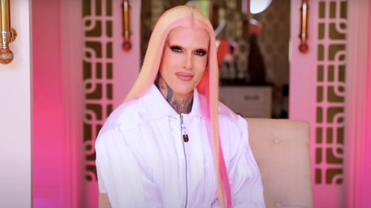 Jeffree Star posing in glam makeup and designer outfit, 2025