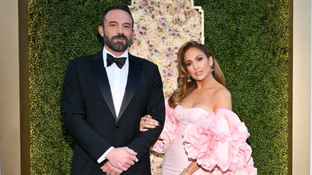 Jennifer Lopez and Ben Affleck attending a red carpet event together before their 2024 split, dressed in formal evening wear and smiling for photographers.