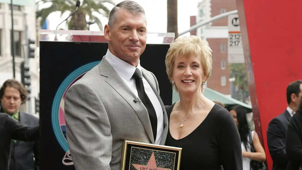 Linda McMahon and Vince McMahon posing together at a public event