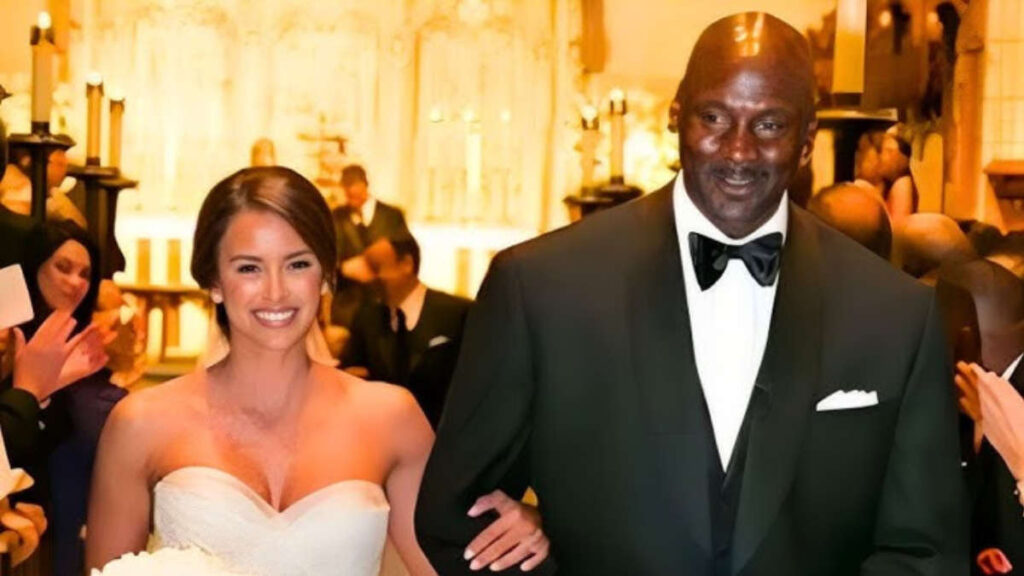 Michael Jordan and Yvette Prieto walking together at their wedding ceremony, dressed in formal attire, smiling and surrounded by guests.