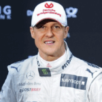 Michael Schumacher driving a Ferrari Formula 1 car during a Grand Prix race