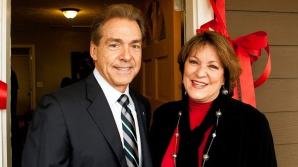 Nick Saban and Terry Saban smiling together at their new house ceremony in Jupiter, Florida, 2025.