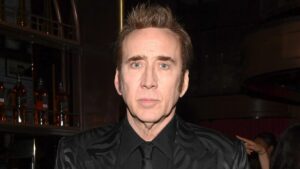 Close-up of actor Nicolas Cage smiling on the red carpet