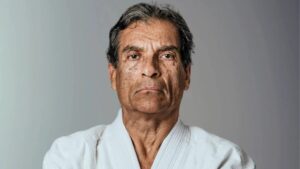Rorion Gracie, Brazilian Jiu-Jitsu grandmaster and UFC co-founder, posing in traditional gi.