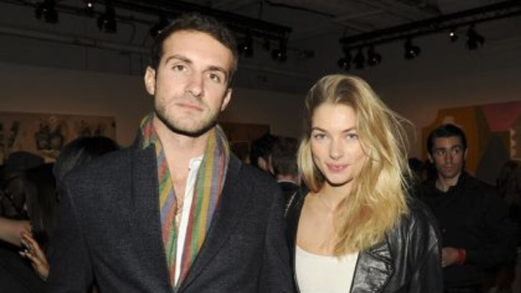 Stavros Niarchos III and Jessica Hart attending a red carpet event together, dressed in formal evening wear