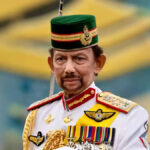 Sultan Hassanal Bolkiah in traditional royal attire during a state ceremony