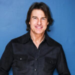 Tom Cruise posing during a professional photo shoot