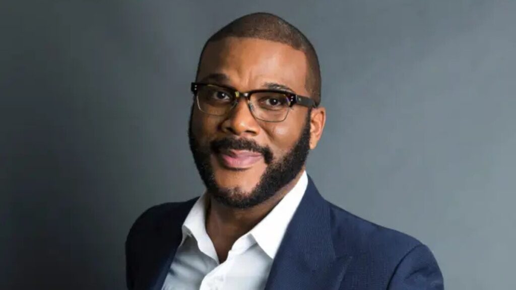 Tyler Perry on the set of a film at Tyler Perry Studios, showcasing his role as a director and producer