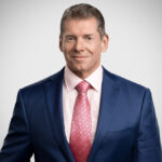 WWE founder Vince McMahon headshot in formal attire