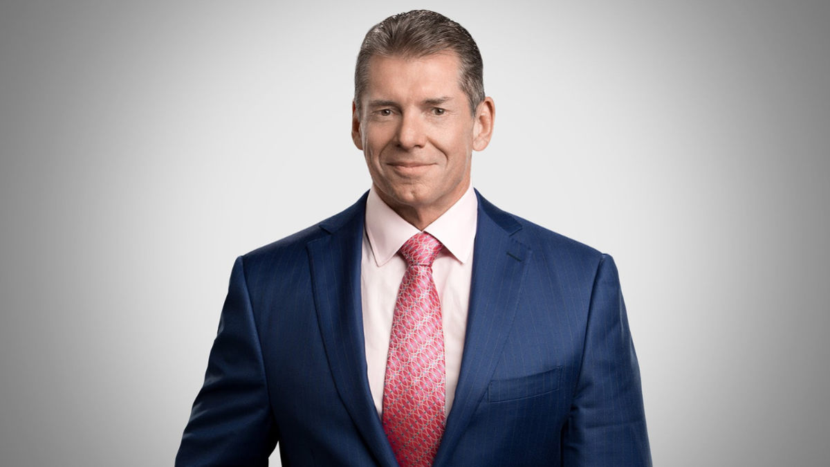 WWE founder Vince McMahon headshot in formal attire
