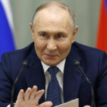Vladimir Putin in official presidential attire during a press conference